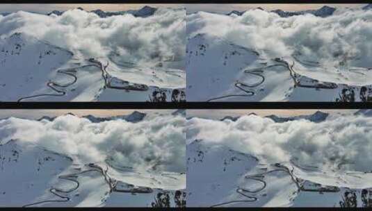 雪域高原公路，雪山云雾缭绕高清在线视频素材下载