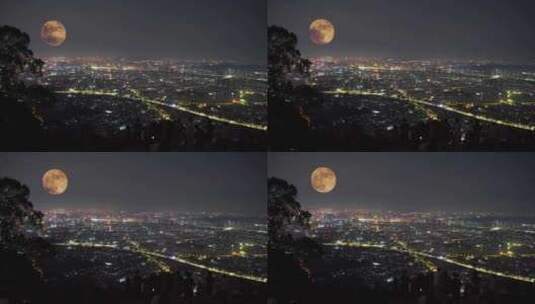 中秋节山顶看夜景中秋赏月城市月亮升起延时高清在线视频素材下载