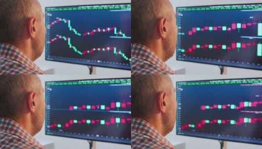 男子在计算机上的数字交易所上检查比特币价格图表高清在线视频素材下载