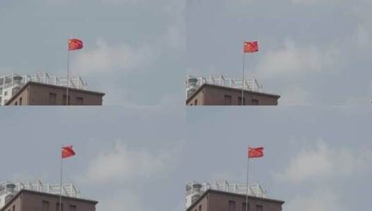 楼顶飘扬的五星红旗高清在线视频素材下载