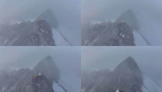 航拍登顶川西横断山脉乌库楚雪山的登山者高清在线视频素材下载