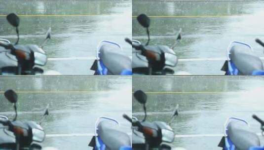 城市下雨摩托车驶过路面高清在线视频素材下载