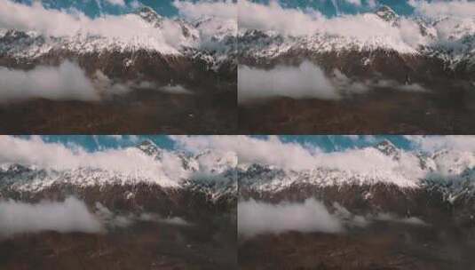 航拍喜马拉雅被雪覆盖的山顶高清在线视频素材下载