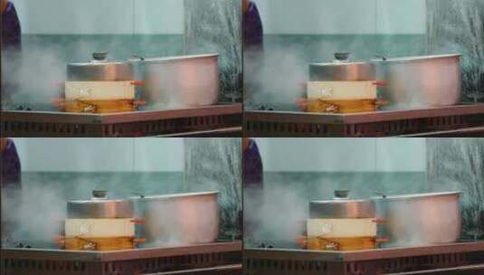 早餐店冒着蒸汽的蒸笼高清在线视频素材下载