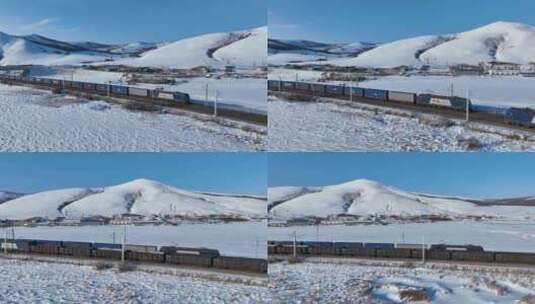 雪原铁路上行驶的货运列车高清在线视频素材下载