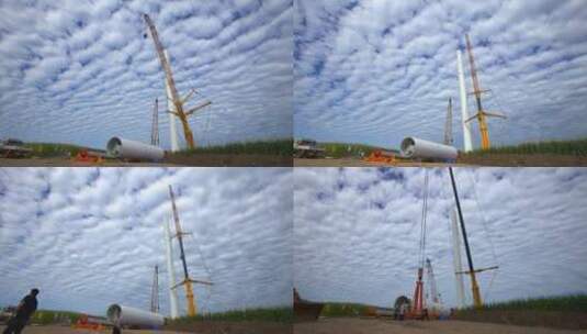 蓝天白云下风机建设 风机安装吊装高清在线视频素材下载