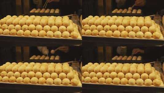 陕西西安回民街美食升格章鱼小丸子慢镜高清在线视频素材下载