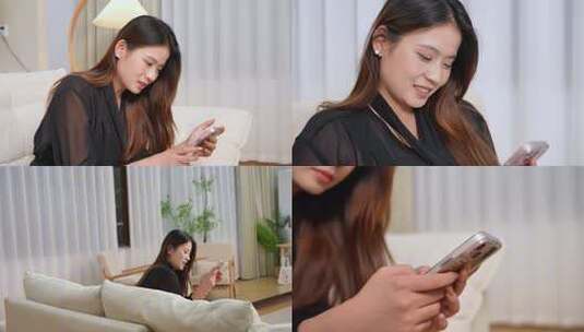 女生居家玩手机高清在线视频素材下载