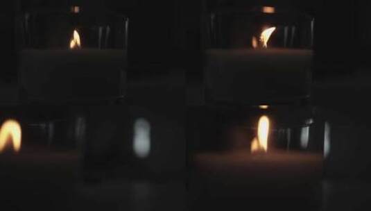 教堂黑暗中的烛光。闪烁的蜡烛。精神氛围高清在线视频素材下载