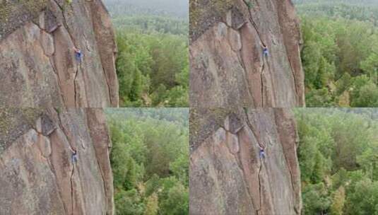 攀岩爱好者攀爬悬崖峭壁高清在线视频素材下载