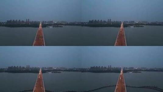 航拍安徽蚌埠龙湖大桥夜景高清在线视频素材下载