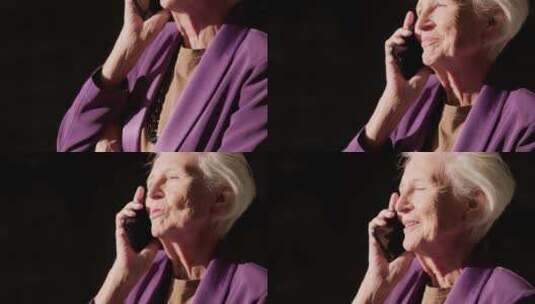 一个穿着紫色外套的女人在打电话高清在线视频素材下载