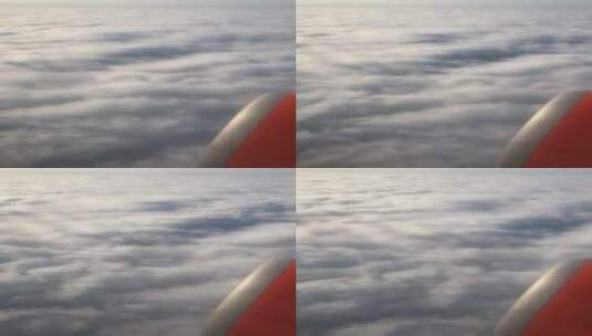 云层上飞行的飞机高清在线视频素材下载