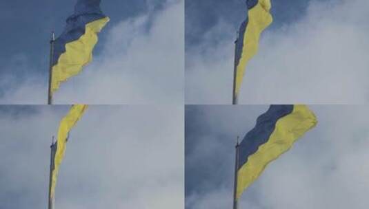 黄蓝相间的旗帜随风飘扬高清在线视频素材下载