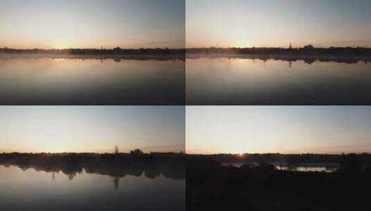日出时拍摄的湖景航拍高清在线视频素材下载