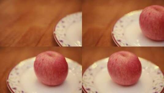 盘子里放一颗苹果高清在线视频素材下载