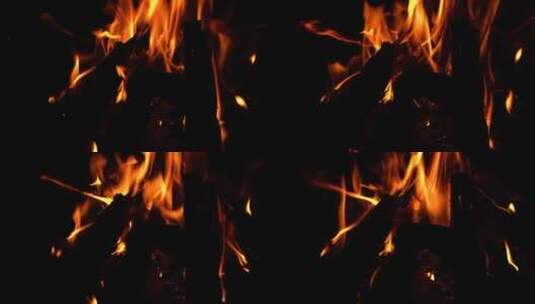 黑暗中营火燃烧的火焰高清在线视频素材下载