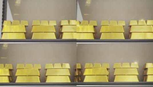 玻璃保险柜中摆放整齐的黄金高清在线视频素材下载