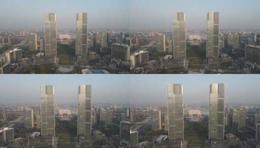 城市航拍郑州绿地双子塔地标建筑高清在线视频素材下载