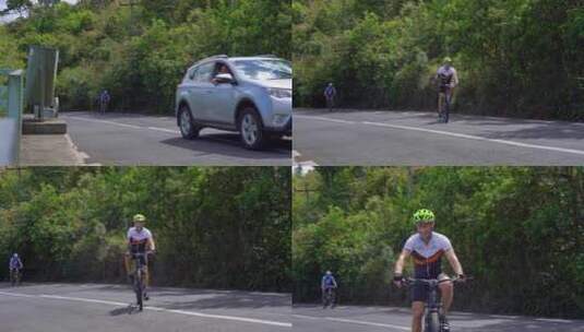 外国男子骑自行车上山竖大拇指高清在线视频素材下载