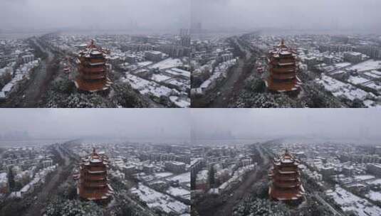 航拍武汉冬天地标5A级旅游景区黄鹤楼雪景高清在线视频素材下载