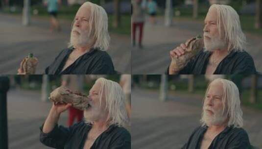 在街头饮酒的白发老人高清在线视频素材下载