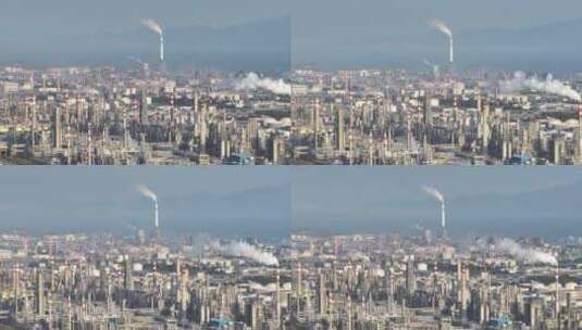 航拍广东惠州大亚湾石化工业园工厂烟囱高清在线视频素材下载
