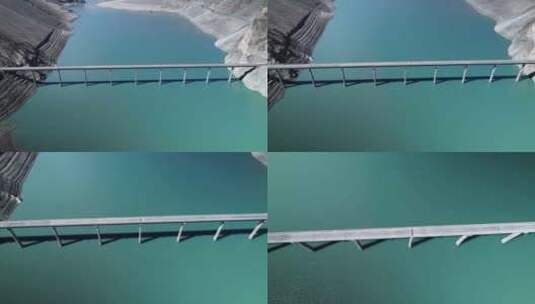 航拍新疆喀什塔县下板地水库大桥高清在线视频素材下载
