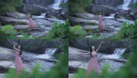 实拍山间小溪高山瀑布跳舞的女孩高清在线视频素材下载