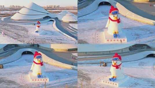中国黑龙江哈尔滨大剧院企鹅大雪人航拍合集高清在线视频素材下载