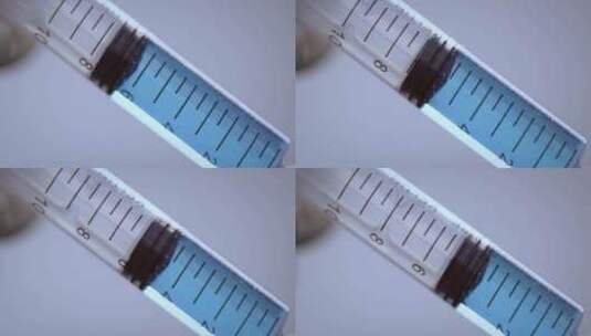 医疗生物仪器注射器注入液体高清在线视频素材下载