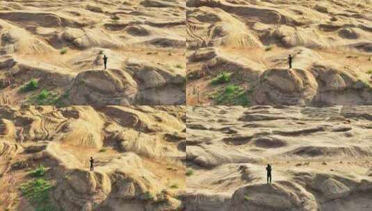 一个人站在丹霞地貌上高清在线视频素材下载