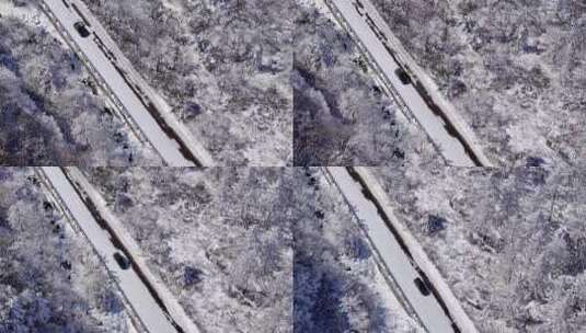 汽车行驶在秦岭210国道雪景道路上高清在线视频素材下载