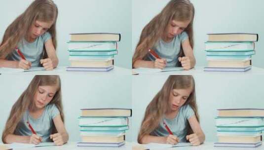 女孩在笔记本上写东西高清在线视频素材下载