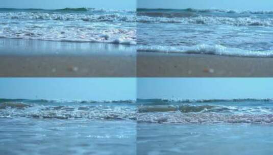 海浪冲刷海滩的特写镜头高清在线视频素材下载