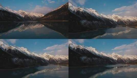 雪山湖泊视频青藏高原日照金山雪峰倒影湖泊高清在线视频素材下载