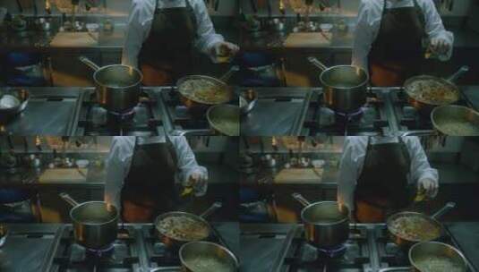 厨师正在厨房烹饪美食高清在线视频素材下载