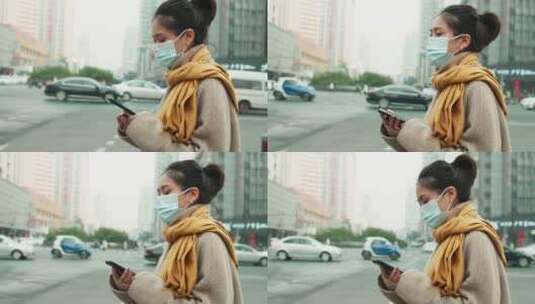 成都街头戴口罩的女青年在看手机高清在线视频素材下载