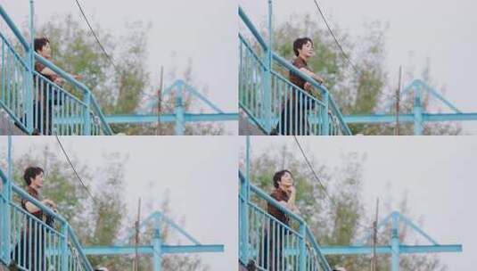 穿香云纱的旗袍女子栏杆上眺望远方展望思考高清在线视频素材下载