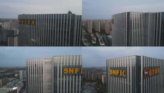 百联南桥南方国际大厦SNFIC建筑环绕航拍4K高清在线视频素材下载