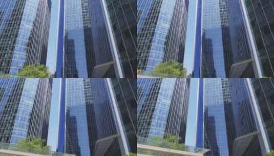 仰拍玻璃幕墙现代办公大楼高清在线视频素材下载