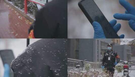 秋雪 保安 操作手机防控疫情高清在线视频素材下载