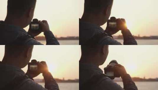 摄影师在轮船甲板上拍摄海上夕阳高清在线视频素材下载