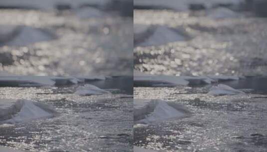 阳光下的冰雪流水变焦升格4k100帧灰片高清在线视频素材下载