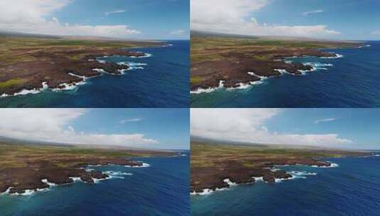 夏威夷大岛宁静海洋和黑色熔岩岩石海岸的景色。航拍高清在线视频素材下载