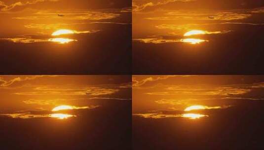 日落十分太阳上空有飞机飞过高清在线视频素材下载