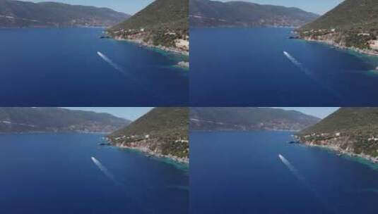 航拍快艇行驶在蓝色海面上高清在线视频素材下载