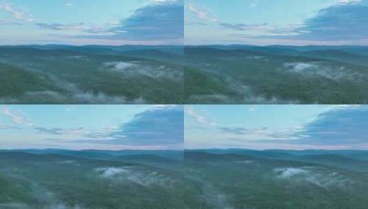 航拍黄昏下的云雾山林高清在线视频素材下载