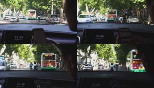 城市道路车窗外风景汽车城市道路公交车行驶高清在线视频素材下载