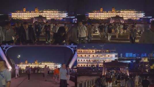 夜晚武汉知音号游轮码头上下游轮的旅客人流高清在线视频素材下载